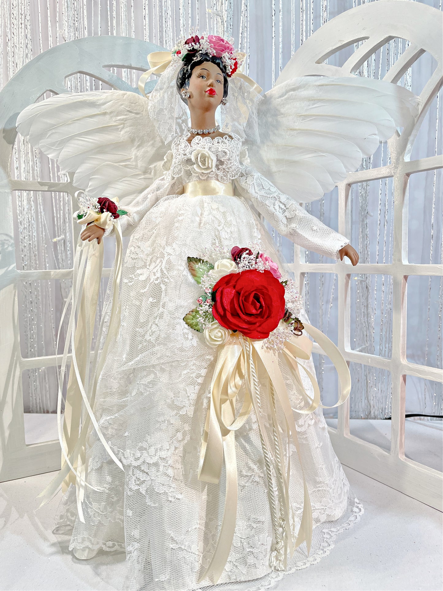 African American Christmas Angel dressed in ivory lace with red and pink floral accents