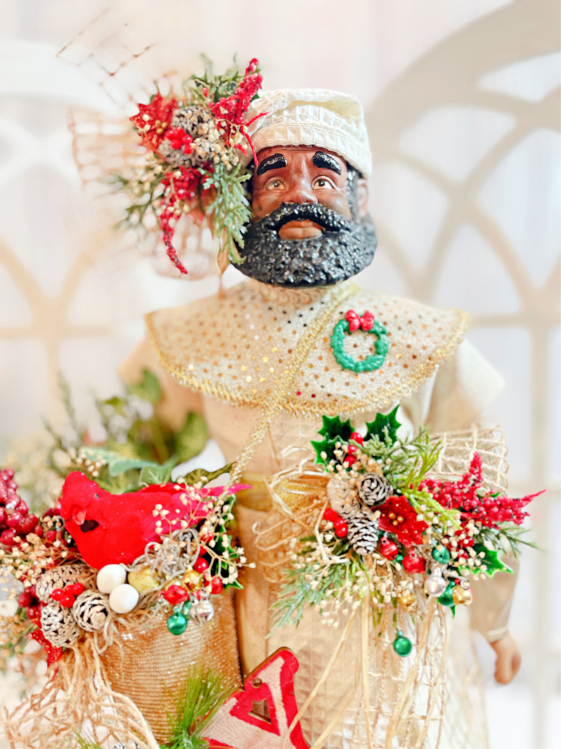 Black Male Christmas Decoration dressed in ivory and red